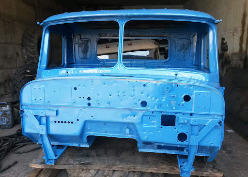 Покраска капота автомобиля КАМАЗ Покраска капота автомобиля КАМАЗ